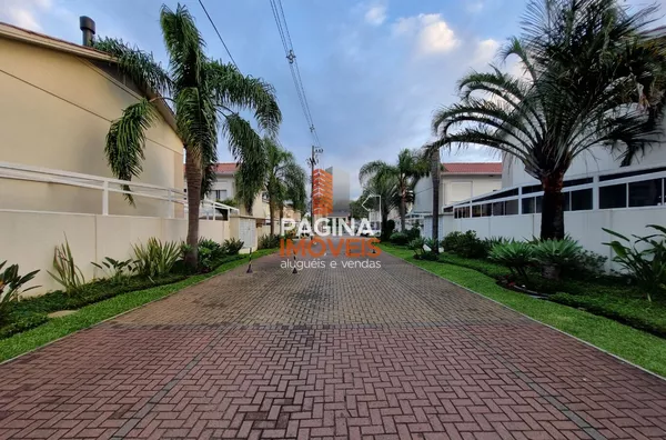 Página 1 Imóveis anuncia ótima casa para venda no condomínio "Jardim do Lago", com 2 Dormitórios no bairro Marechal Rondon em Canoas/RS. - Foto 1