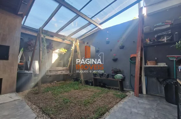Página 1 Imóveis anuncia para venda uma excelente e encantadora casa de 02 dormitório, no bairro Harmonia em Canoas/RS.