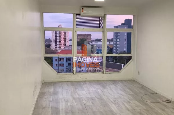 Página 1 Imóveis anuncia sala comercial com lavabo no condomínio "Empresarial Baronio", no bairro Centro em Canoas/RS.