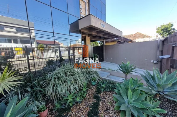 Página 1 Imóveis anuncia belíssima sala comercial com recepção/sala de espera e 01 vaga de garagem no bairro Marechal Rondom, Canoas/RS. - Foto 2