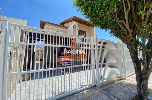 Página 1 Imóveis anuncia para venda ótima casa com piscina de 03 dormitórios, sendo 1 suíte, no bairro Harmonia em Canoas/RS. - Foto 1