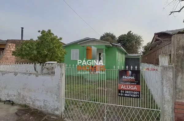 Pagina 1 Imóveis anuncia para aluguel, "casa com 2 dormitórios" no bairro Harmonia em Canoas/RS.