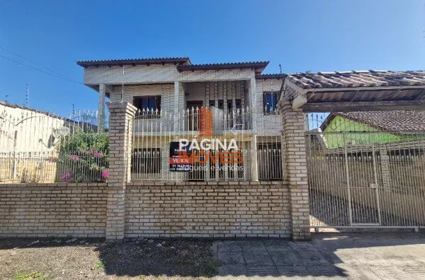 Página 1 Imóveis anuncia linda e aconchegante  "Casa  03 dormitórios", no Bairro Harmonia em Canoas/RS.