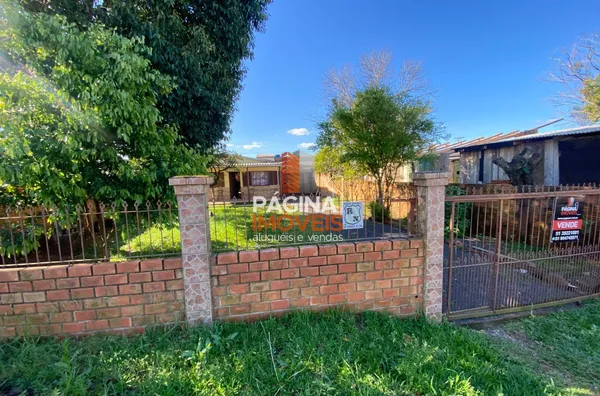 Página 1 Imóveis anuncia para venda, ampla "casa com 2 dormitórios" no bairro Harmonia em Canoas–RS.