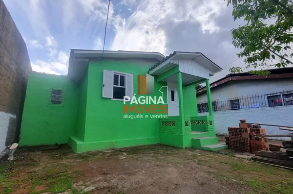 Pagina 1 Imóveis anuncia para aluguel, "casa com 2 dormitórios" no bairro Harmonia em Canoas/RS.