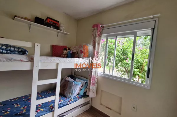 Página 1 Imóveis anuncia para venda um encantador apartamento 02 dormitórios, no condomínio Jardim Baviera, no bairro Igara em Canoas.