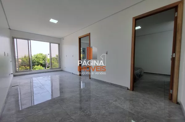 Living dois ambientes integrado a cozinha