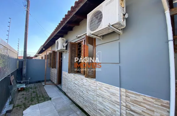 Página 1 Imóveis anuncia para venda, "casa 02 dormitórios" no bairro Olaria em Canoas–RS.