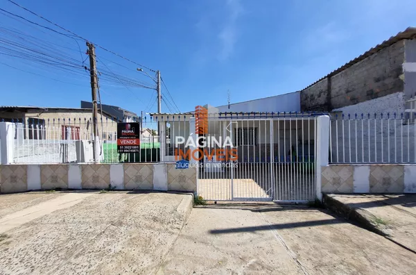 Página 1 Imóveis anuncia para venda ampla casa de esquina com 02 dormitórios e mais um sobrado nos fundos com 01 suíte e sacada no bairro Harmonia em Canoas/RS. - Foto 1