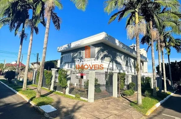Página 1 Imóveis anuncia maravilhosa "casa" para venda com 5 dormitórios e 3 suítes, no Bairro Marechal Rondon em Canoas–RS. - Foto 3