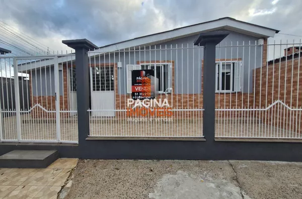 Página 1 Imóveis anuncia casa com 03 dormitórios no bairro Guajuviras em Canoas/RS. - Foto 1