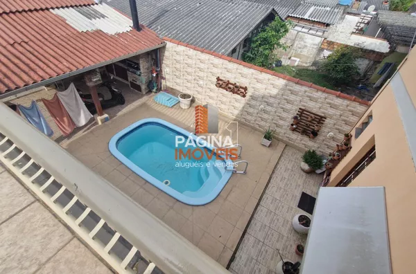 Página 1 imóveis anuncia excelente "Casa 02 dormitórios" para venda no bairro Harmonia em Canoas/RS