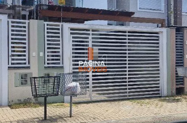 Página 1 Imóveis anuncia para venda, uma excelente casa/sobrado com 03 dormitórios, sendo 01 suíte, no bairro Igara em Canoas/RS.