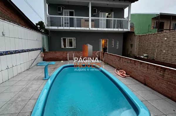 Página 1 Imóveis anuncia venda de casa com piscina e 4 dormitórios, sendo 1 suíte, no Bairro Harmonia em Canoas/RS. - Foto 2