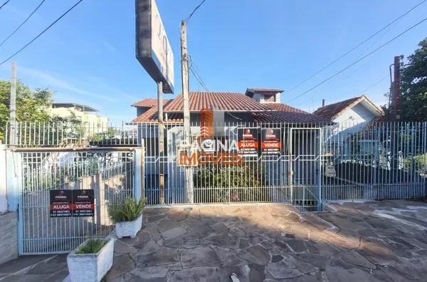 Página 1 Imóveis anuncia excelente e ampla casa mista de 03 dormitórios, sendo 01 suíte e 03 salas comerciais com acesso externo, no bairro São José, Canoas/RS. - Foto 1