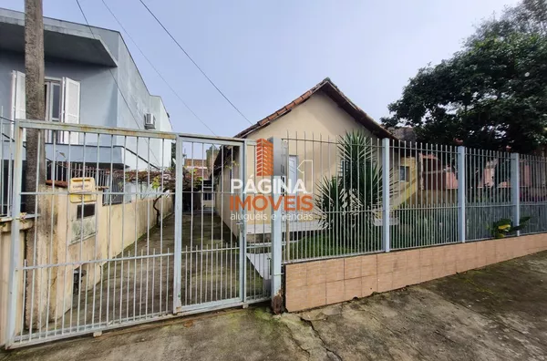 Página 1 Imóveis anuncia casa mista de 3 dormitórios com amplo terreno, para venda no bairro Nossa Senhora das Graças, Canoas/RS. - Foto 2