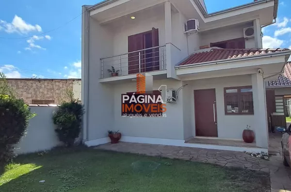 Página 1 Imóveis anuncia casa com 3 dormitórios no bairro Rio Branco em Canoas–RS. - Foto 2