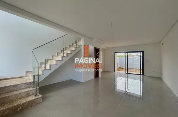 Página 1 Imóveis anuncia excelente casa para venda, com 03 dormitórios, sendo 01 suíte, no bairro Estância Velha em Canoas/RS.