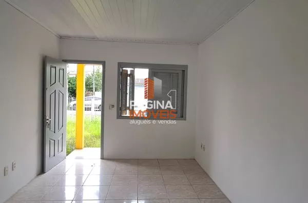 Página 1 Imóveis anuncia excelente casa térrea de 02 dormitórios para aluguel, no bairro Fátima, em Canoas/RS.