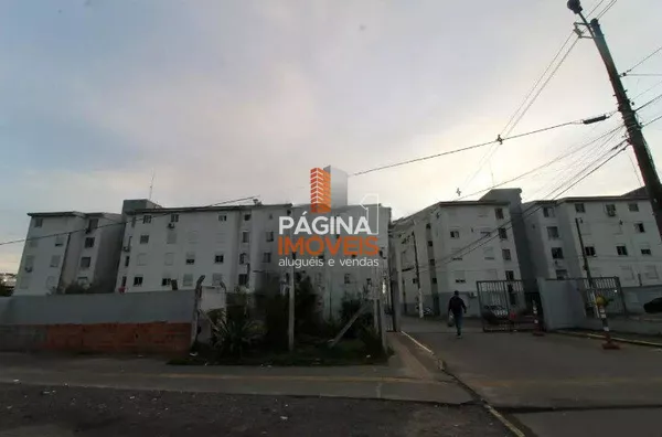 Página 1 Imóveis anuncia para venda apartamento de 2 dormitórios no "Condomínio Residencial Guajuviras 2", bairro Olaria, em Canoas–RS. - Foto 1