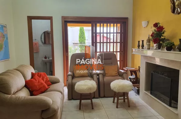 Página 1 Imóveis anuncia primorosa casa com 03 dormitórios, sendo 02 suítes, para venda no bairro São José em Canoas/RS. - Foto 1