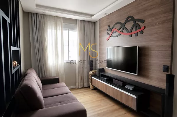 Sala de TV com possibilidade de ser revertida em um terceiro quarto