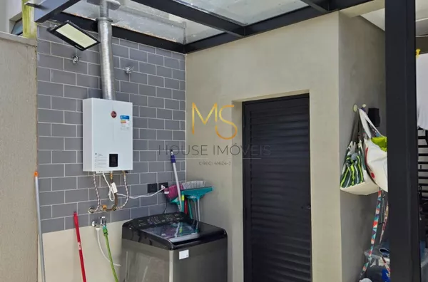 Área de serviço com lavabo externo