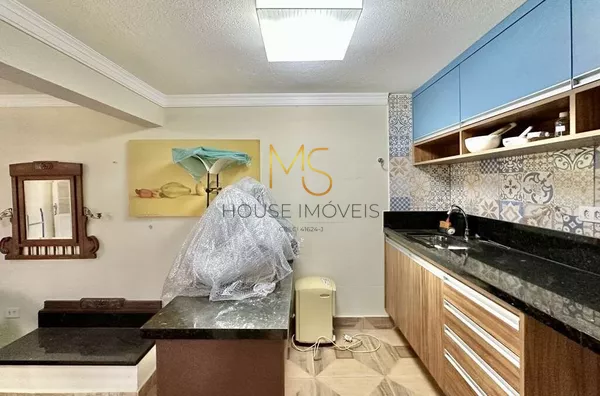 Cozinha do apartamento anexo à casa