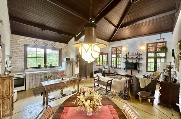 Sala de estar, jantar e ccozinha integradas
