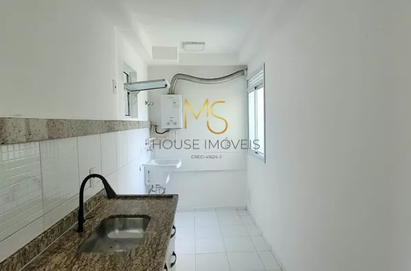 Cozinha integrada com a área de serviço