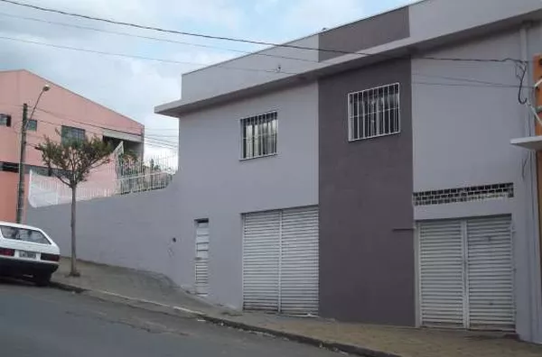Sala comercial em alvenaria medindo aproximadamente 130,00m² com 02 portas de aço e 02 wc's - Foto 2