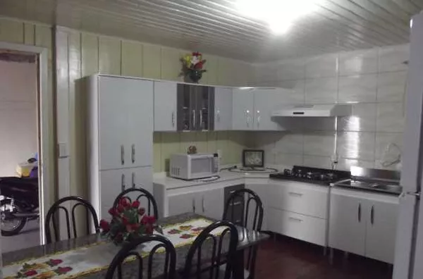 Casa mista contendo 01 quarto, 01 suíte,  sala, cozinha, wc, area de serviço, area de churrasqueira, quintal grande, varanda, wc externo, porão e garagem - Foto 5