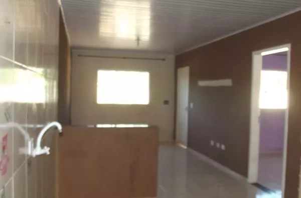 Casa em alvenaria com 3 quartos, sala, cozinha, banheiro, lavanderia e churrasqueira com forno e fogão a lenha, entrada para carro. - Foto 5