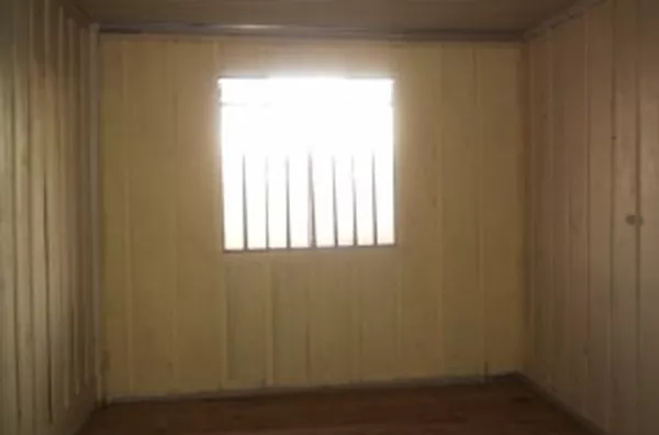 Casa em madeira, contendo 02 quartos, sala, cozinha, wc, área de serviço e garagem. - Foto 6