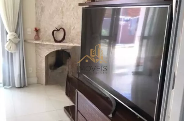 Linda casa em condomínio fechado de alto padrão na cidade de Vinhedo com 4 suítes, sendo no piso térreo uma suíte master com closet e hidromassagem e ar condicionado, sala ampla com lareira , escritório, lavabo, ampla cozinha planejada com copa, despensa, - Foto 18