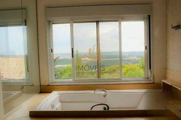 Casa à venda com 5 suítes em  condomínio de alto padrão na cidade de Louveira.  Lindo sobrado moderno e com fino acabamento, são 760m² de construção em um terreno de 1.890m², o andar superior oferece 3 suítes sendo a master com closet e banheira com hidro - Foto 15