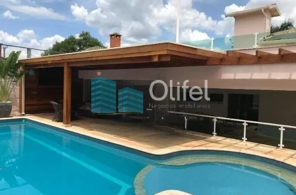 Linda casa em condomínio fechado de alto padrão na cidade de Vinhedo com 4 suítes, sendo no piso térreo uma suíte master com closet e hidromassagem e ar condicionado, sala ampla com lareira , escritório, lavabo, ampla cozinha planejada com copa, despensa, - Foto 1