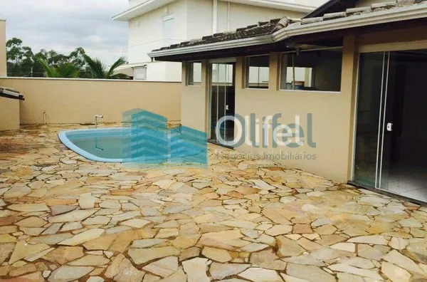 Excelente casa térrea em condomínio fechado na cidade de Louveira com 3 suítes, sala de estar, jantar e TV, cozinha ampla e planejada, banheiro social, linda área gourmet com churrasqueira com fechamento em vidro, piscina e vagas de garagem.  Imóvel rico - Foto 3