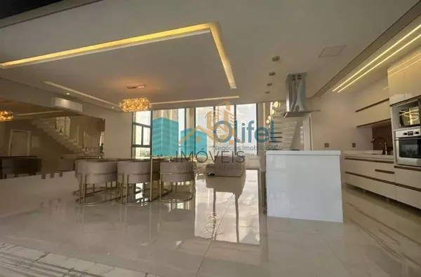 Linda casa no  condomínio  Santa Isabel na cidade de Louveira para quem procura espaço, modernismo, sofisticação, sossego e excelente iluminação. O imóvel dispõe de 525m² de terreno e 414m² de construção. O piso inferior oferece sala ampla  para 2 ambient - Foto 6