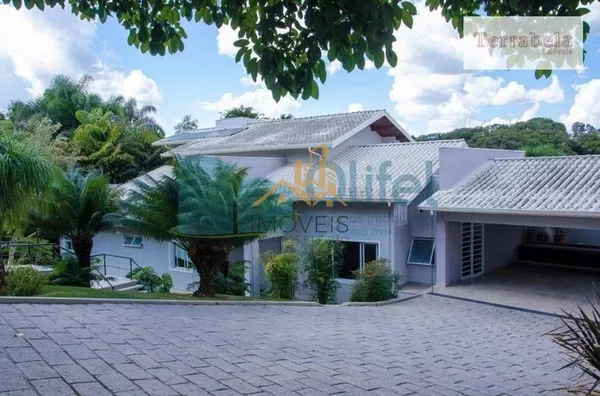 Casa residencial à venda, condomínio Estância Marambaia, Vinhedo. Maravilhosa casa, implantada em 4 lotes unificados que são passíveis de desmembramento, recentemente reformada, possui sala de estar com varanda e lago de carpas, sala de jantar, home theat - Foto 45