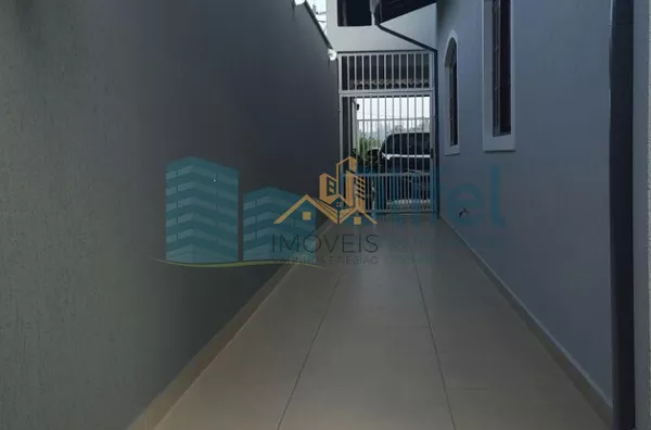 Ótima casa em bairro tranquilo na cidade de Louveira com 3 dormitórios sendo 1 suíte, sala 2 ambientes, cozinha americana com armários, edícula com churrasqueira gourmet e banheiro, quintal e garagem para 4 carros. - Foto 15