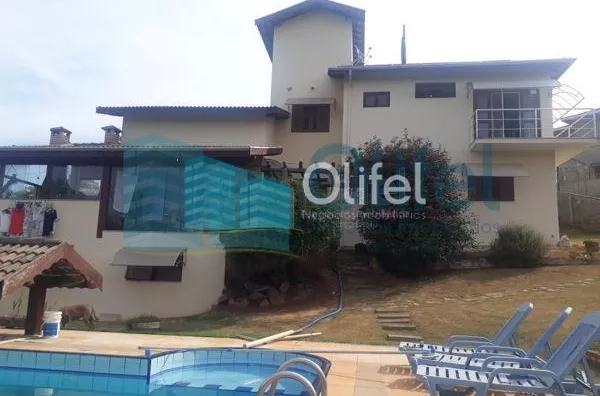 Excelente sobrado na cidade de  Louveira, com 4 dormitórios, sendo 1 suíte master com closet, banheiro social, quartos avarandados, lavabo, ampla sala de estar, jantar e mezanino, escritório, cozinha, copa, lavanderia, despensa, área gourmet com churrasqu - Foto 2