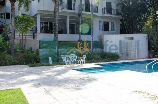 Casa residencial à venda, condomínio Estância Marambaia, Vinhedo. Maravilhosa casa, implantada em 4 lotes unificados que são passíveis de desmembramento, recentemente reformada, possui sala de estar com varanda e lago de carpas, sala de jantar, home theat - Foto 4