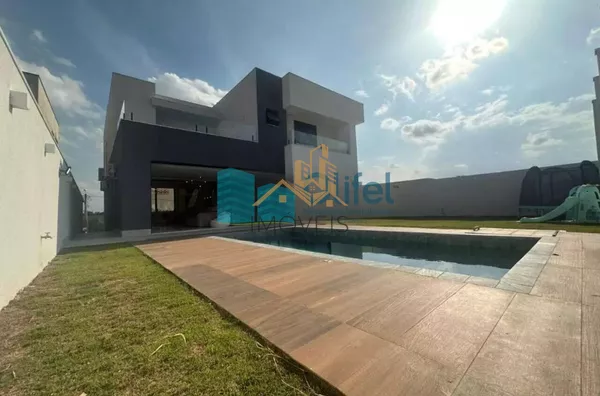 Linda casa no  condomínio  Santa Isabel na cidade de Louveira para quem procura espaço, modernismo, sofisticação, sossego e excelente iluminação. O imóvel dispõe de 525m² de terreno e 414m² de construção. O piso inferior oferece sala ampla  para 2 ambient - Foto 2