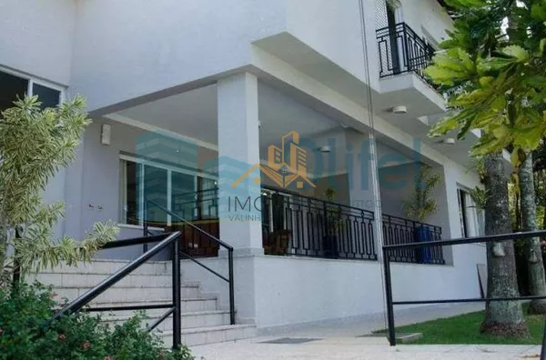 Casa residencial à venda, condomínio Estância Marambaia, Vinhedo. Maravilhosa casa, implantada em 4 lotes unificados que são passíveis de desmembramento, recentemente reformada, possui sala de estar com varanda e lago de carpas, sala de jantar, home theat - Foto 37