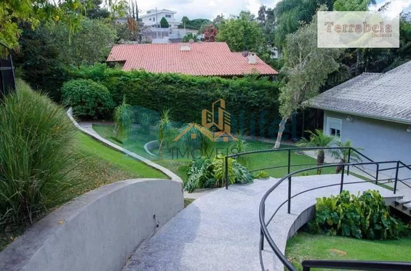 Casa residencial à venda, condomínio Estância Marambaia, Vinhedo. Maravilhosa casa, implantada em 4 lotes unificados que são passíveis de desmembramento, recentemente reformada, possui sala de estar com varanda e lago de carpas, sala de jantar, home theat - Foto 44