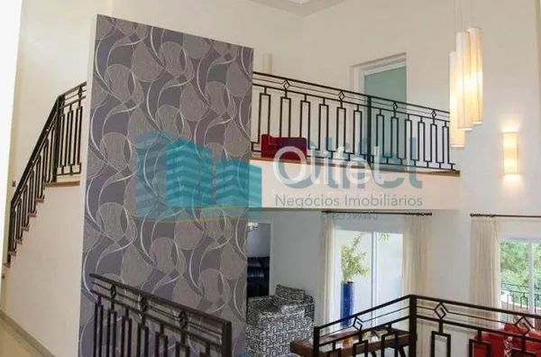 Casa residencial à venda, condomínio Estância Marambaia, Vinhedo. Maravilhosa casa, implantada em 4 lotes unificados que são passíveis de desmembramento, recentemente reformada, possui sala de estar com varanda e lago de carpas, sala de jantar, home theat - Foto 6