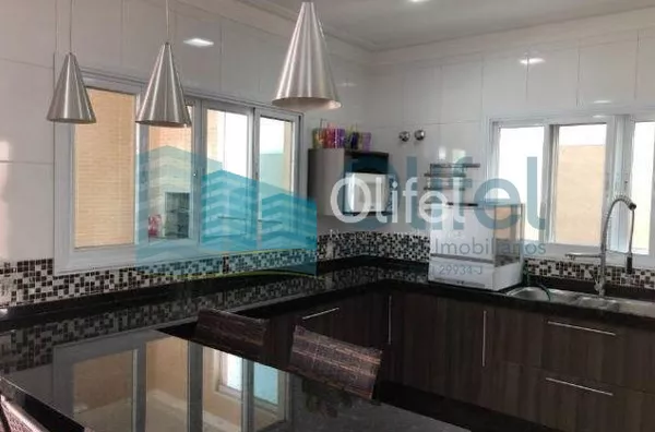 Sobrado em condomínio na cidade de Louveira,  com 3 dormitórios, 2 suítes, sendo 1 master com closet, escritório, sala 3 ambientes, home theater, ampla cozinha rica em armários, despensa, lavanderia, área gourmet com varanda, piscina aquecida, todo piso e - Foto 16