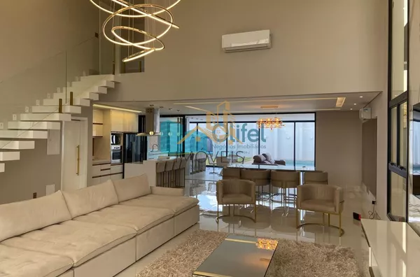 Linda casa no  condomínio  Santa Isabel na cidade de Louveira para quem procura espaço, modernismo, sofisticação, sossego e excelente iluminação. O imóvel dispõe de 525m² de terreno e 414m² de construção. O piso inferior oferece sala ampla  para 2 ambient - Foto 4