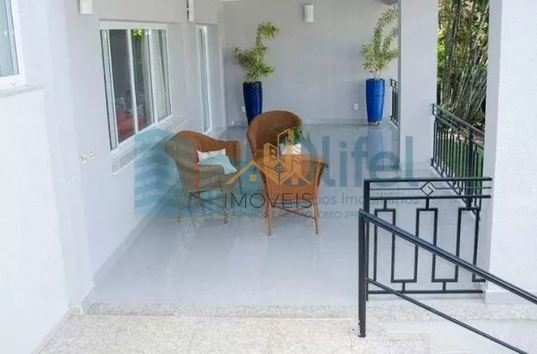 Casa residencial à venda, condomínio Estância Marambaia, Vinhedo. Maravilhosa casa, implantada em 4 lotes unificados que são passíveis de desmembramento, recentemente reformada, possui sala de estar com varanda e lago de carpas, sala de jantar, home theat - Foto 34
